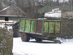 SX12131 Green farm trailer in snow.jpg